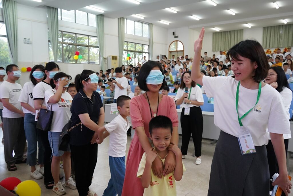 Activity at a summer camp for the families of workers at manufacturing supplier's facility